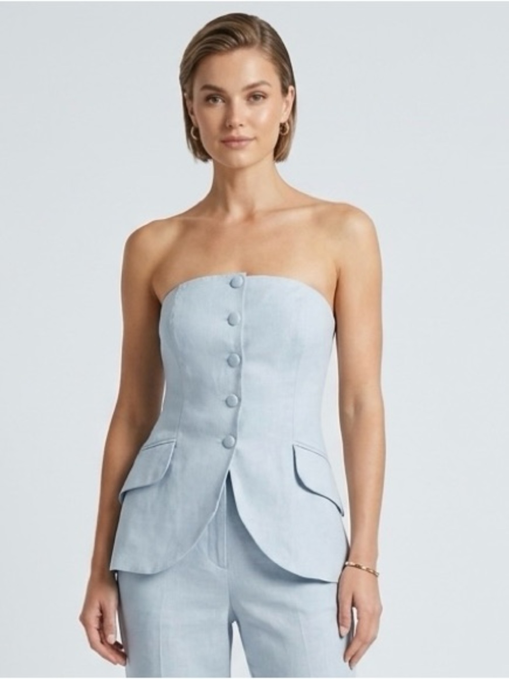 Olivaceous Strapless Light Blue 100% Linen Top. Faux buttons and pockets. Sz Med